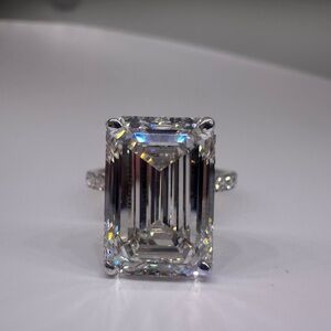 7.43 carat G VS1 emerald cut lab diamond engagement ring on a pavé band